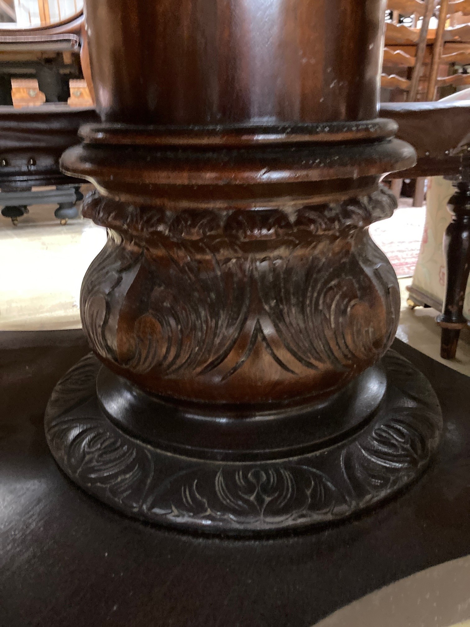 A large reproduction mahogany extending dining table, 174cm extended, width 138cm, height 77cm